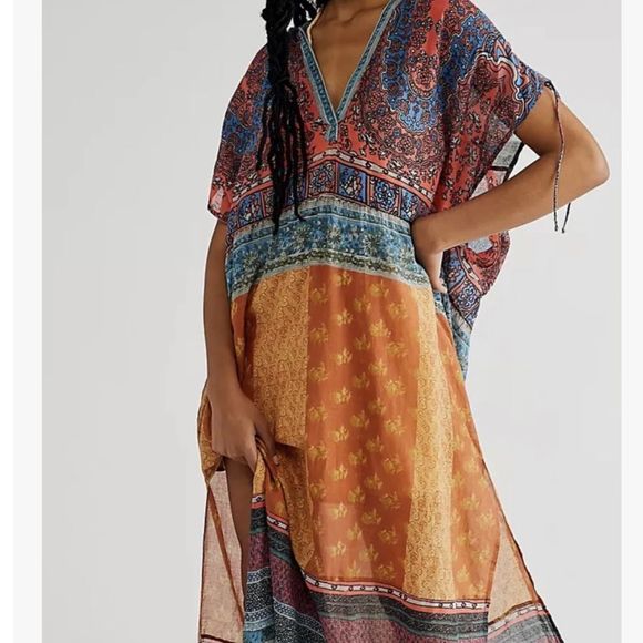 NWT Free People Rosalee Maxi Dress
Hooded Mix Floral Print Orange
retail $168 - Picture 2 of 7